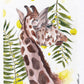 Giraffe with leaves