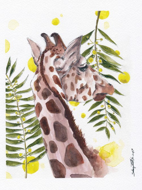 Giraffe with leaves